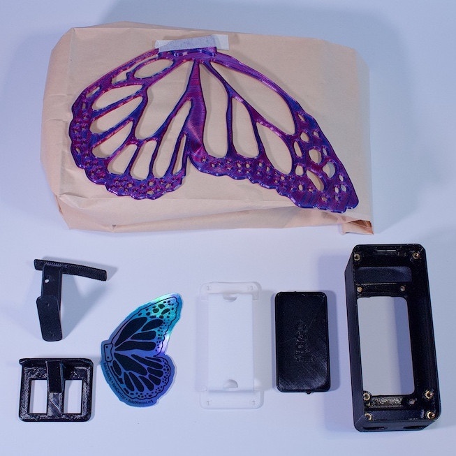 Photo of 3D printed pieces in the box