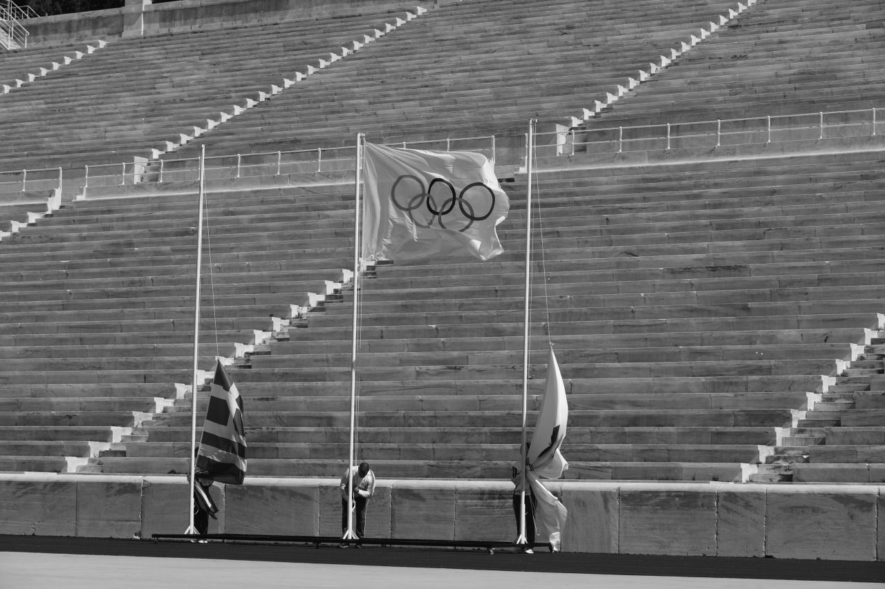 Olympic flag raising. Japanese and Greek too? Photo: IOC