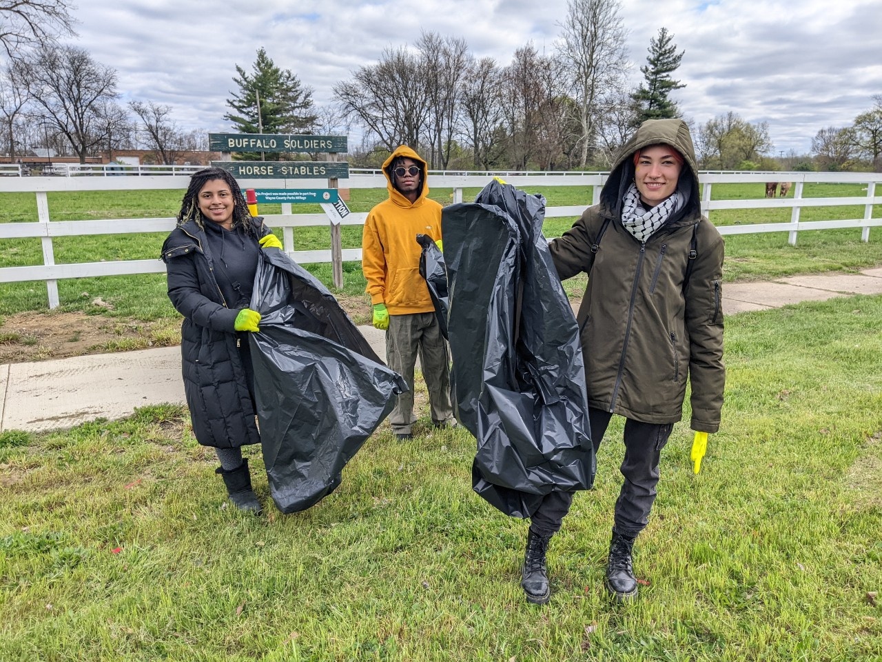 Volunteers clean up trash along Joy Road