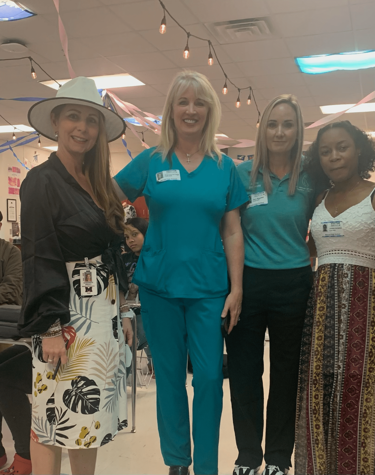 Four women at Manvel High School pictured. From the left, Mrs. Chadisty Pauly (A & P Teacher) Renee Arriaga (Director) Ashley Bagwell (Advocate & Mommy Model) and Janisha Stewart