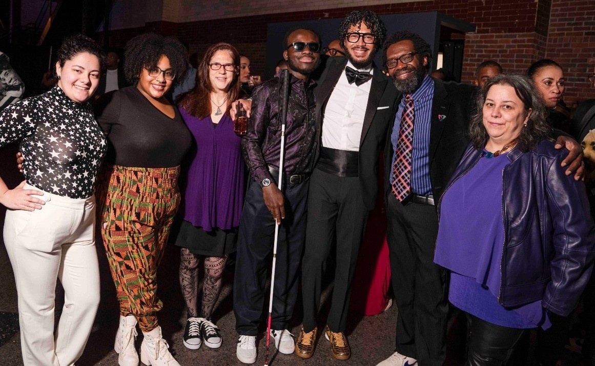 Vox team and community with Embrace Boston President Imari Paris Jeffries.