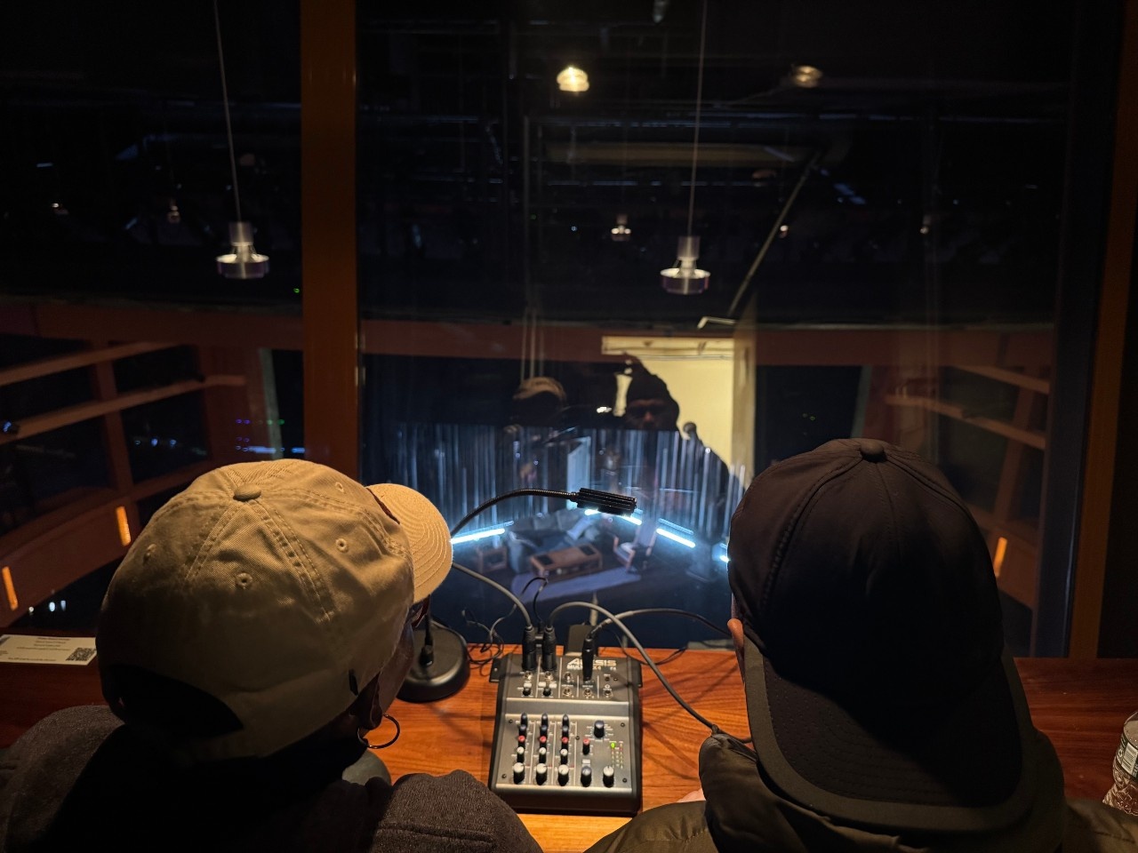 Vivian and Dave sitting in the upper booth facing the stage at The Grove at Calderwood Pavilion.
