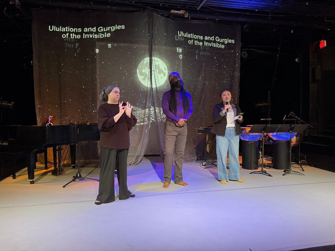 Antoine Hunter, aka PurpleFireCrow, ED of Urban Jazz Dance Company, and Yooree Losordo, ED of Guerilla Opera, and an ASL/English interpreter for Ululations and Gurgles of the Invisible.