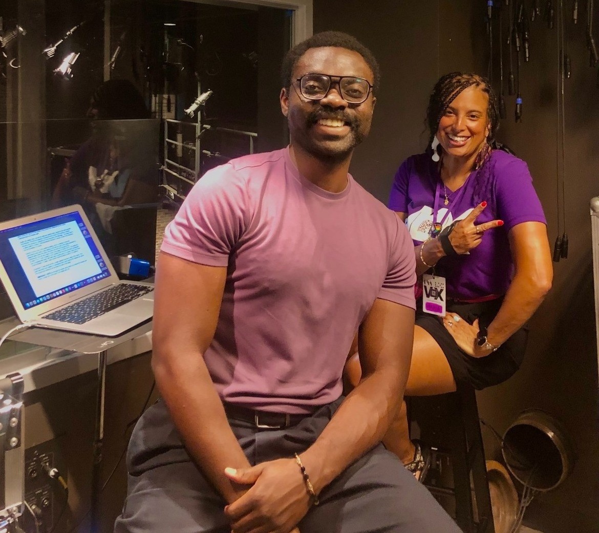 Maria and Joshua in the booth for In Old Age, smiling.