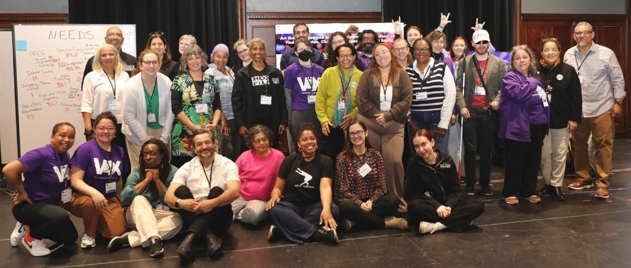 CARE Fair arts administrators and directors with VOX and ROX facilitators in a group photo.