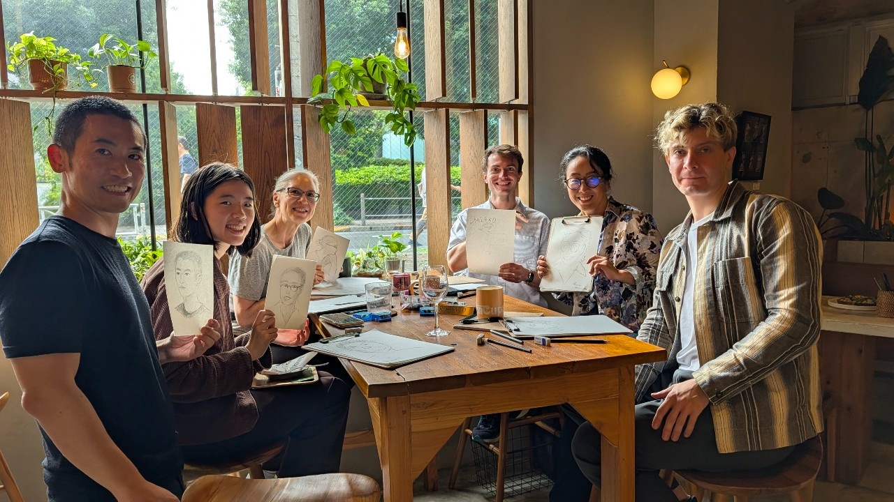 Draw & Yap participants with their drawings