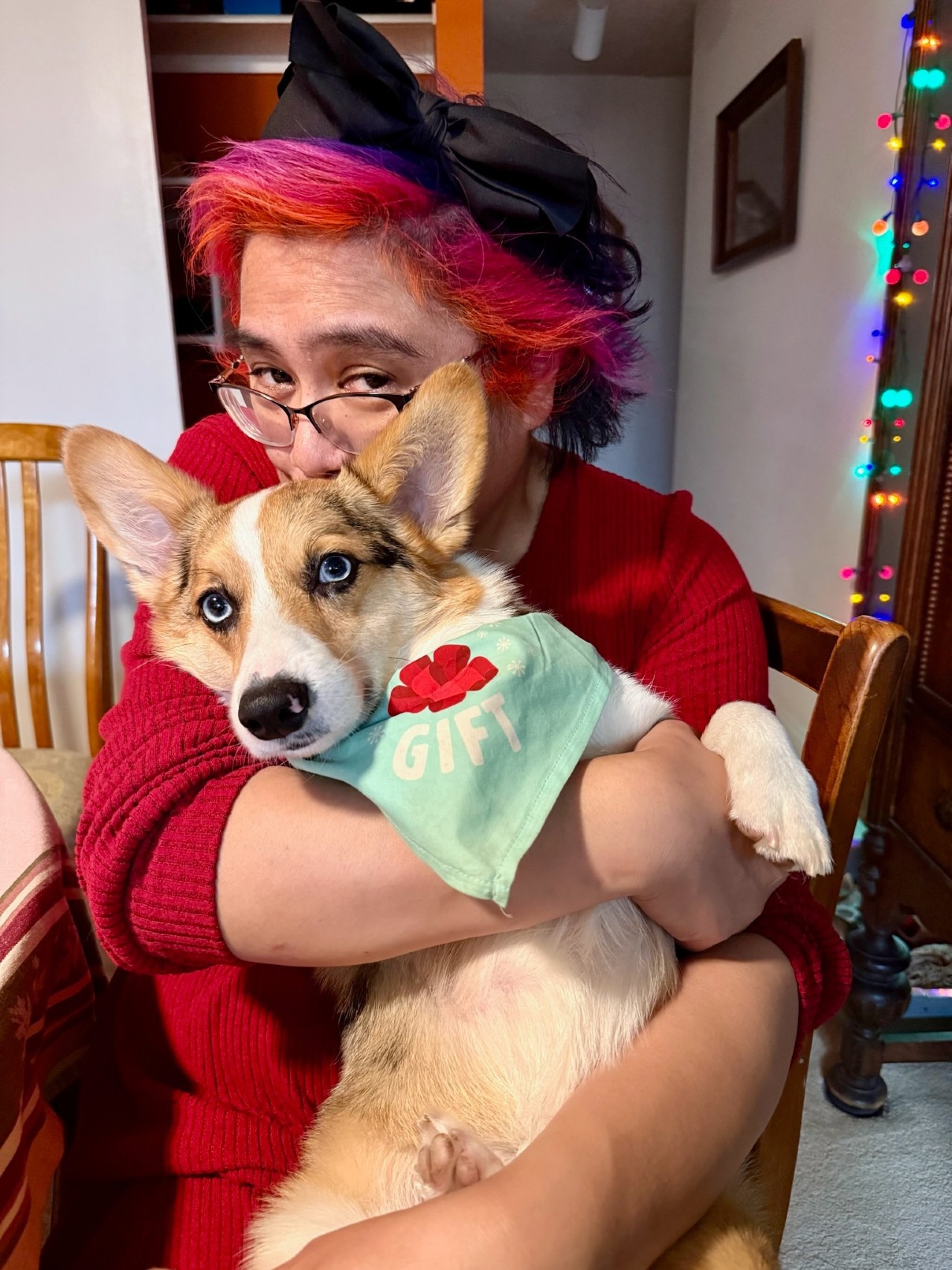 Valdoria snuggling Art the corgi