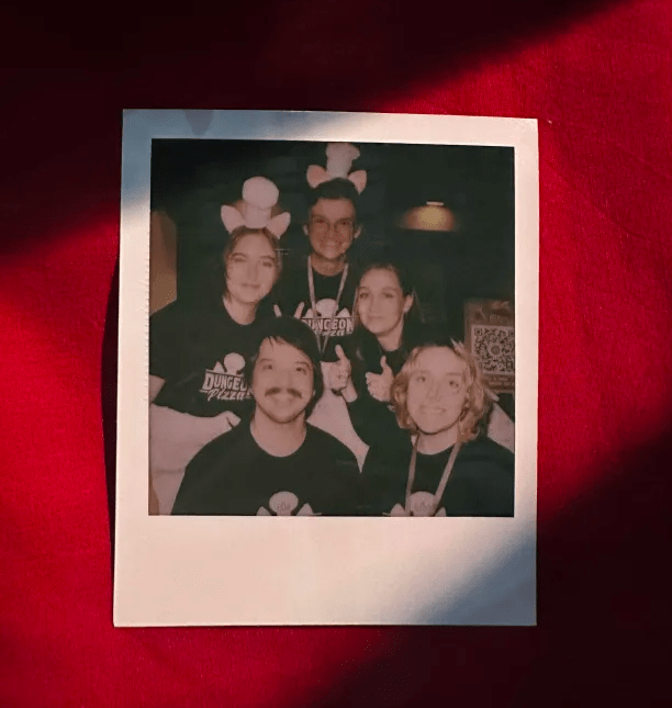 Image description: A polaroid photo of the team