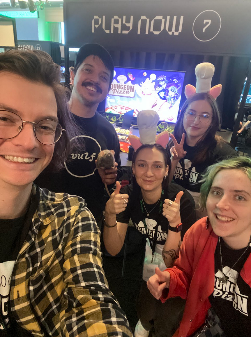 The Dungeon Pizza team infront of our booth at Play Now