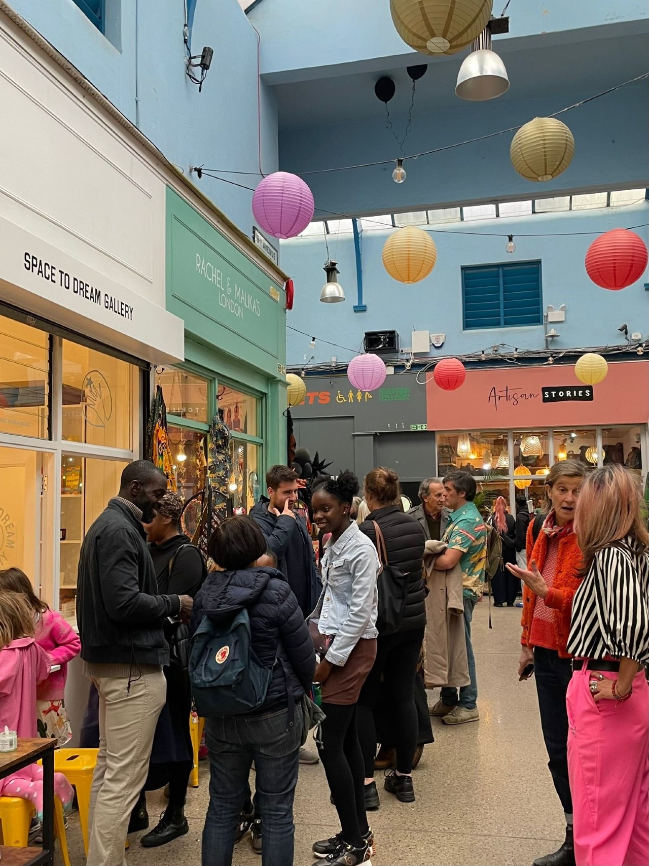 Crowd of People gathered in front of the Space to Dream gallery for the opening of the new HOME exhibition on the 1st of November 2025.