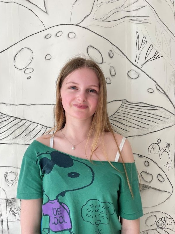 Portrait of Sigrun in the gallery during her work experience week.