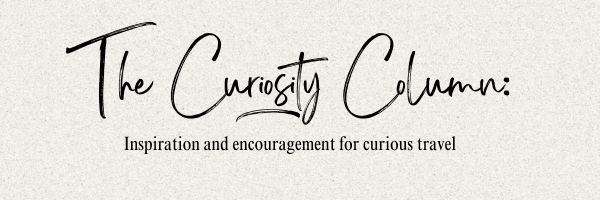 John The Traveler "The Curiosity Column" newsletter masthead: "Inspiration and encouragement for curious travel"