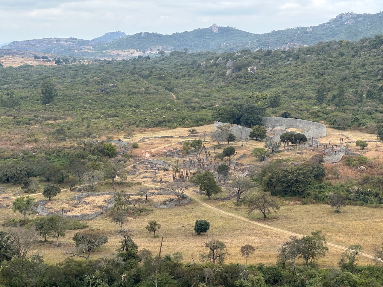 Panorama of landscape that includes Great Zimbabwe ruins and national park
