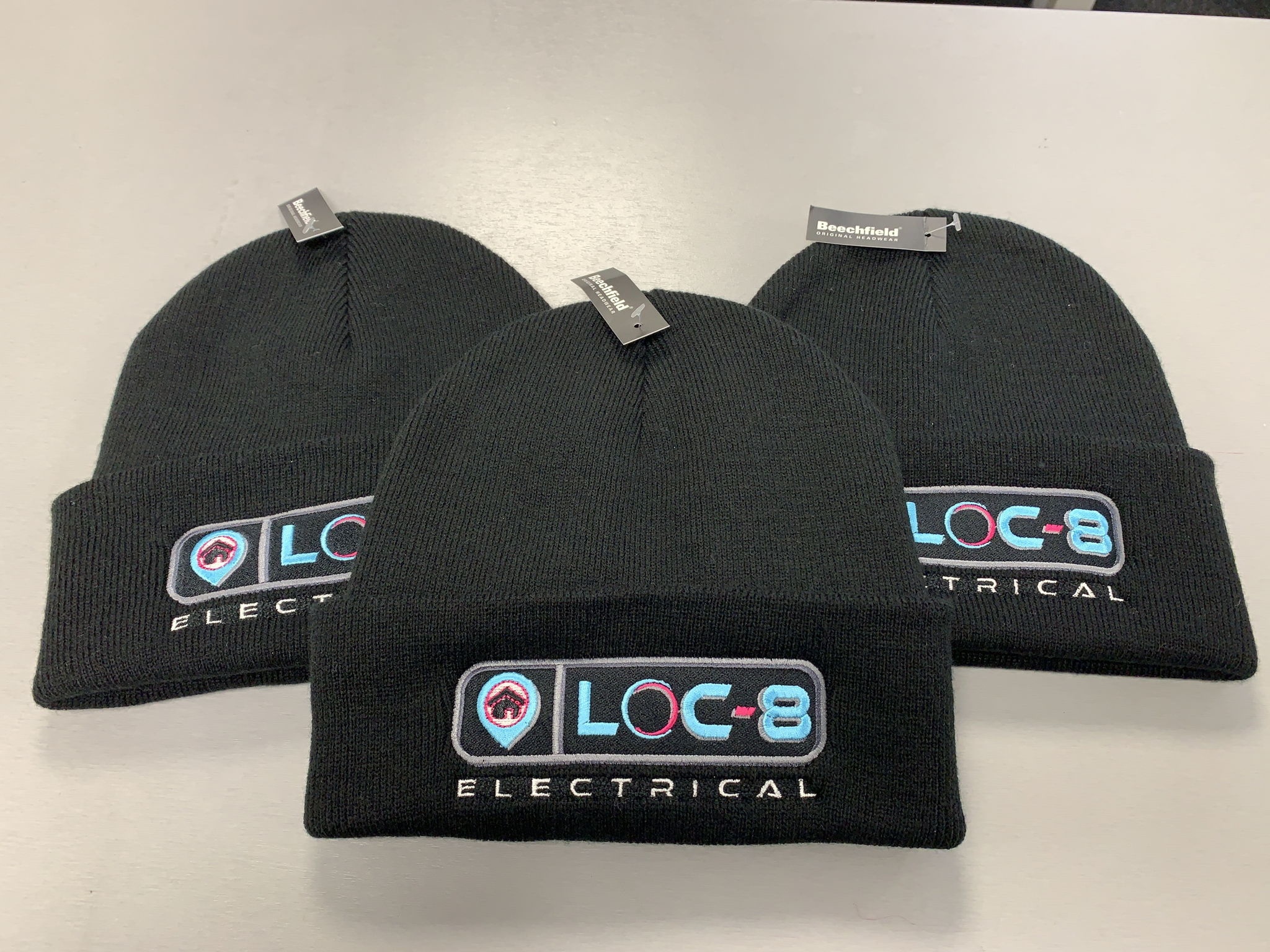 LOC-8 branded beanies with embroidered logos
