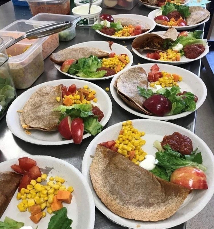 Photo of soft beef tacos and colourful vegetables